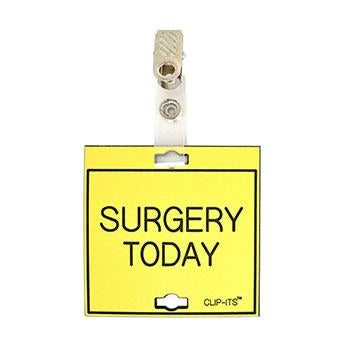 Veterinary dental yellow with black text clip-its cage tag in "Surgery Today" from MAI.